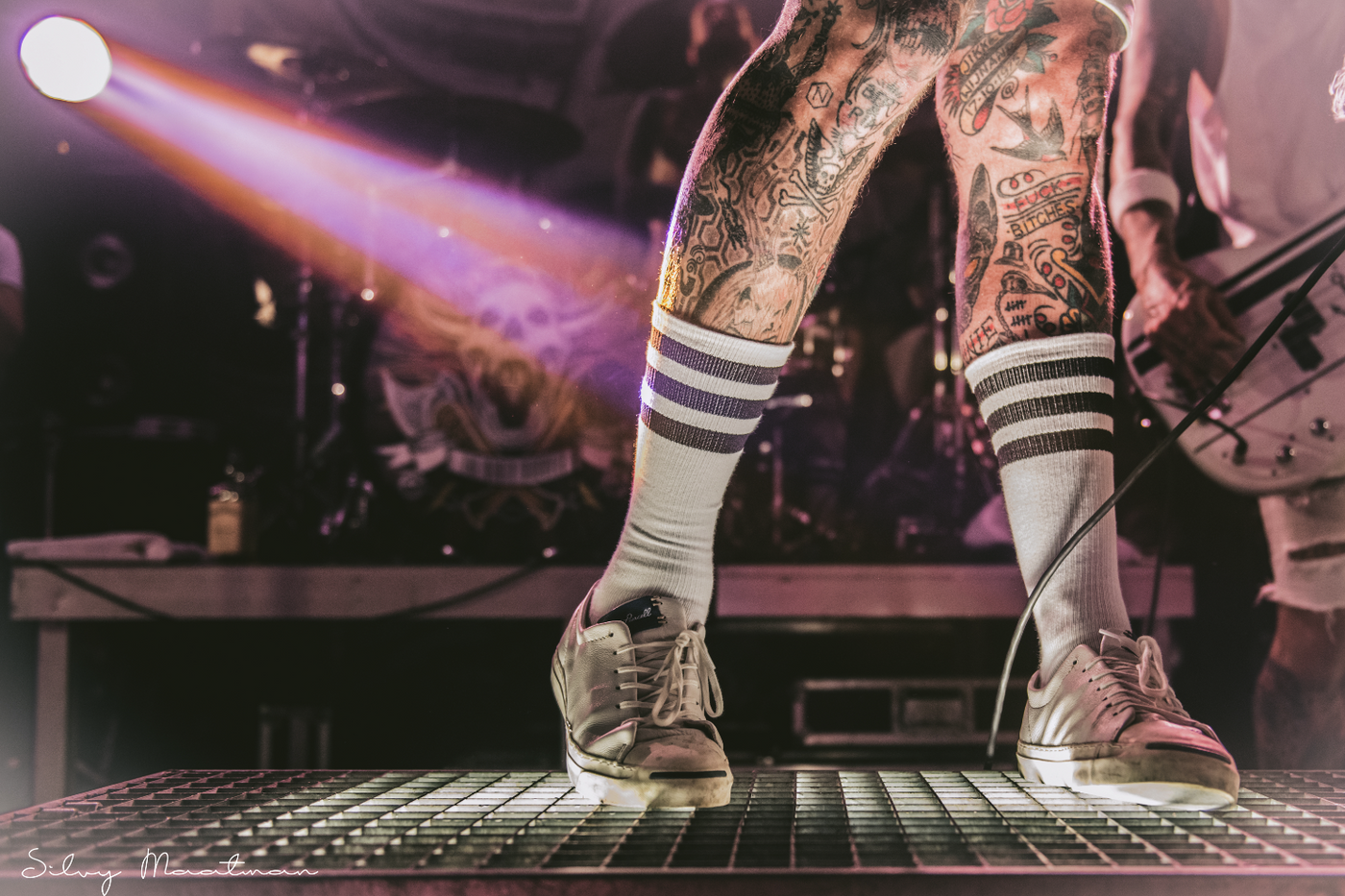 Colorful punk-style striped socks from American Socks, showcasing various heights and designed for durability and comfort.