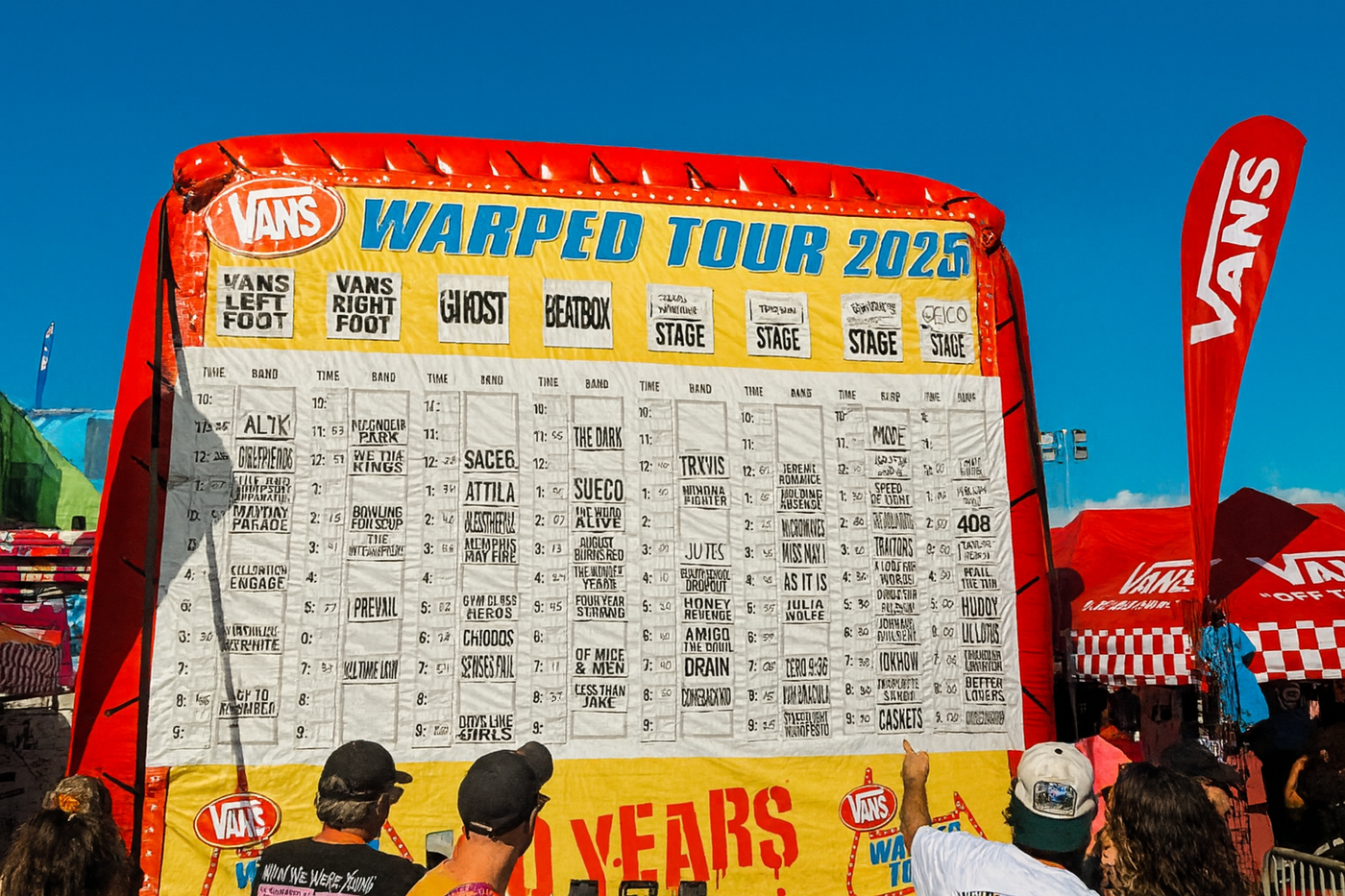 A group of festival-goers at Warped Tour in Orlando, enjoying American Socks giveaways and celebrating the music scene.